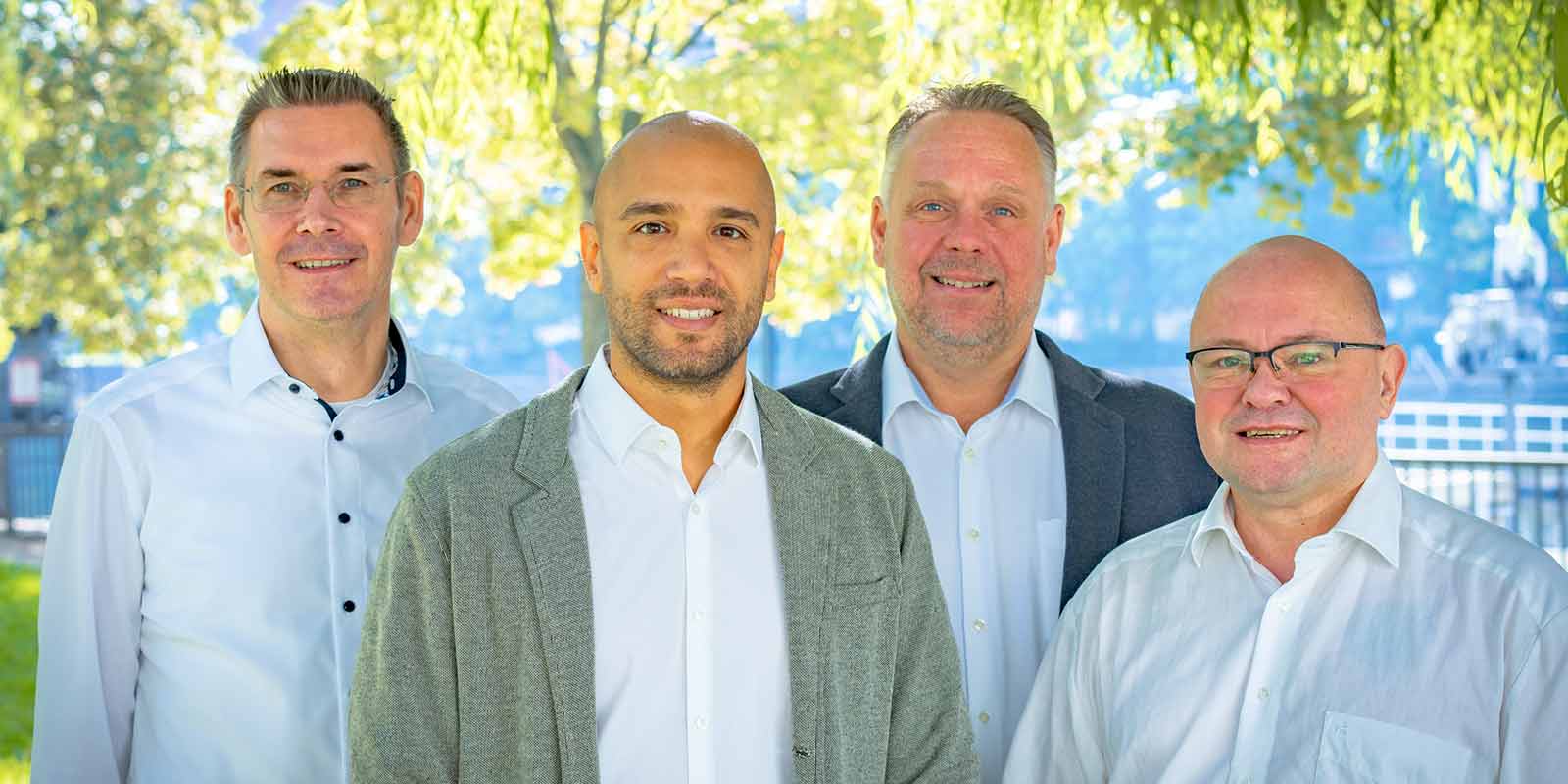 Vier Personen im Portrait